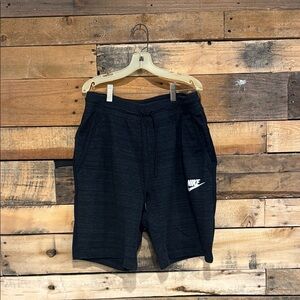 Nike Black Athletic Shorts with Elastic Waistband and Knee Length